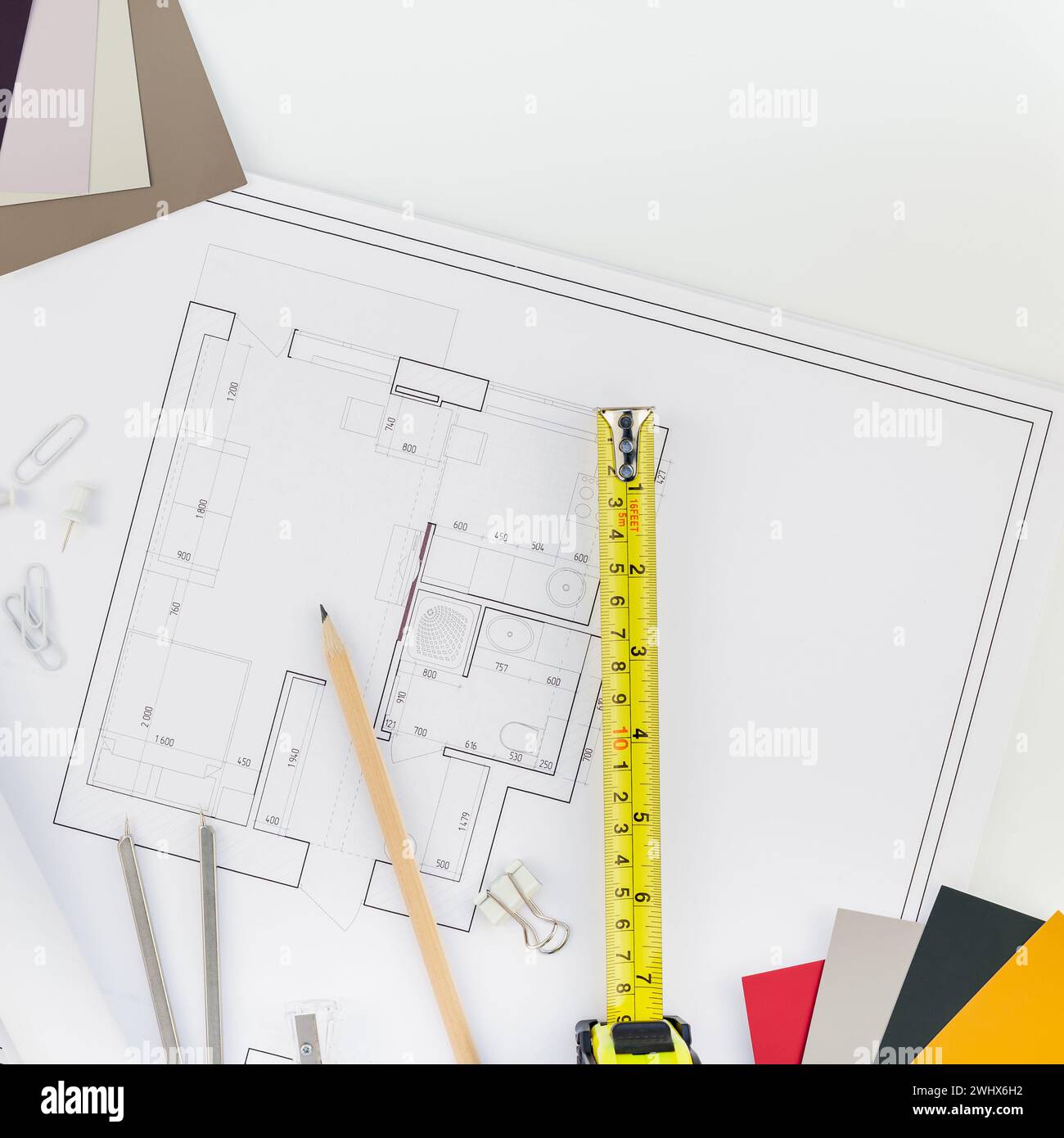 Interior designer table workplace with house plan Stock Photo - Alamy
