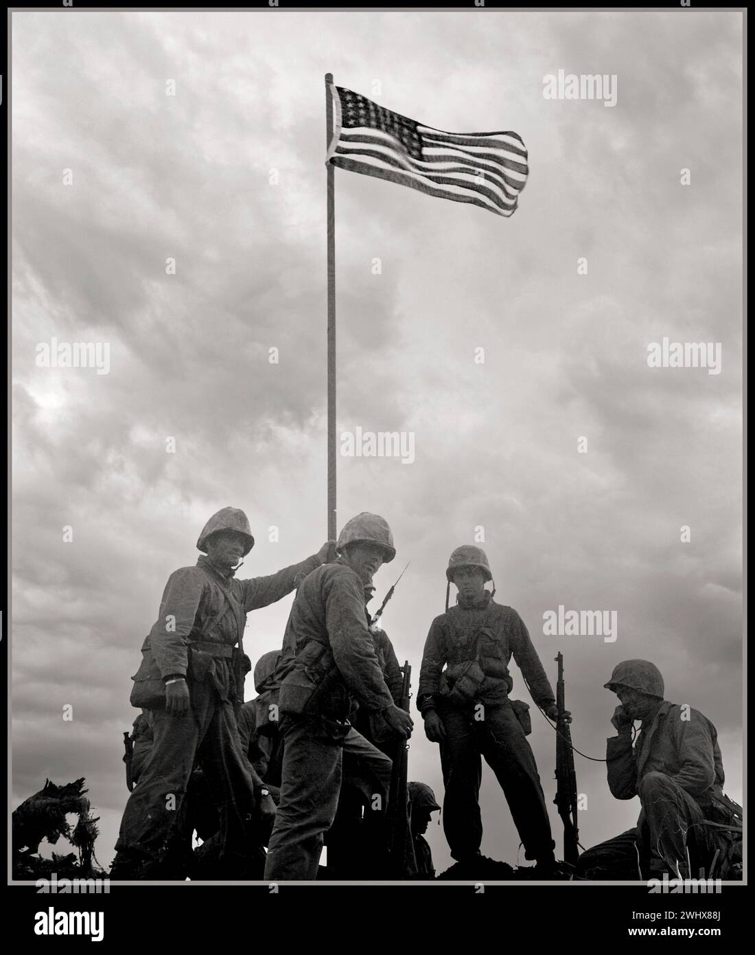 IWO JIMA WW2 First flag raising by American Marines February 1945 The Battle of Iwo Jima was a major battle in which the United States Marine Corps and United States Navy landed on and eventually captured the island of Iwo Jima from the Imperial Japanese Army during World War II. Second World War Pacific War Stock Photo
