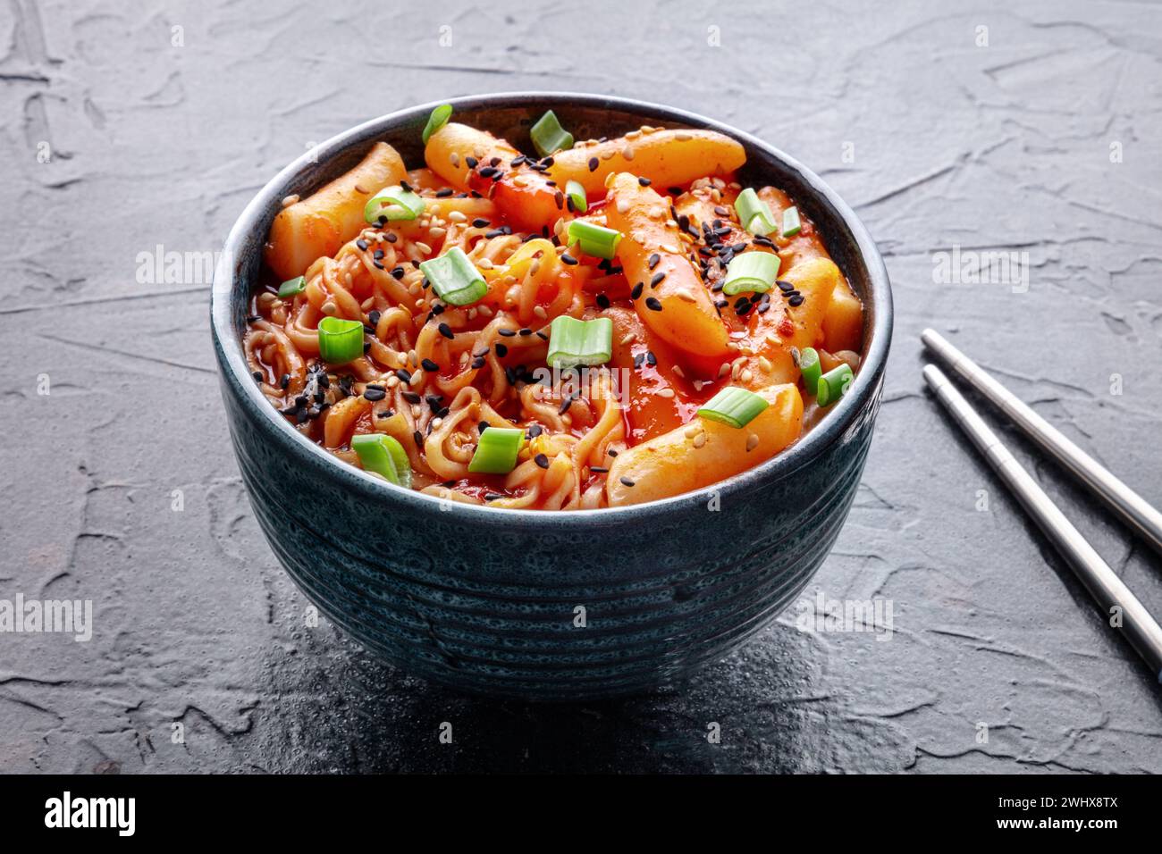 Rabokki, tteokbokki or topokki with ramen, Korean street food, spicy ...