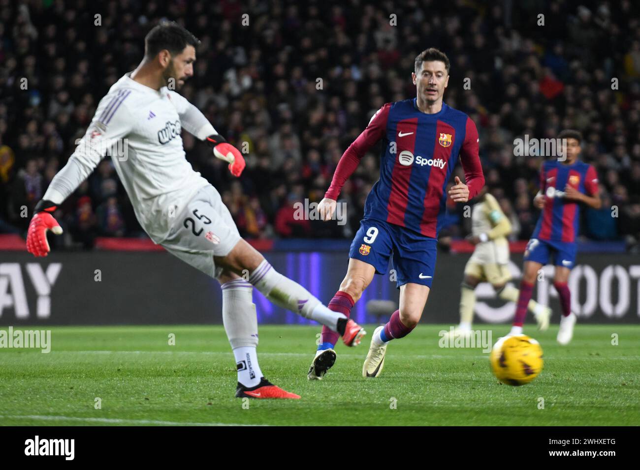 Girona, Spain. 11th Feb, 2024. BARCELONA, SPAIN - FEBRUARY 11: Augusto Batalla of Granada passes the ball during the match between FC Barcelona and Granada as part of La Liga at Lluís Companys Olympic Stadium on February 11, 2024 in Girona, Spain. (Photo by Sara Aribó/PxImages) Credit: Px Images/Alamy Live News Stock Photo