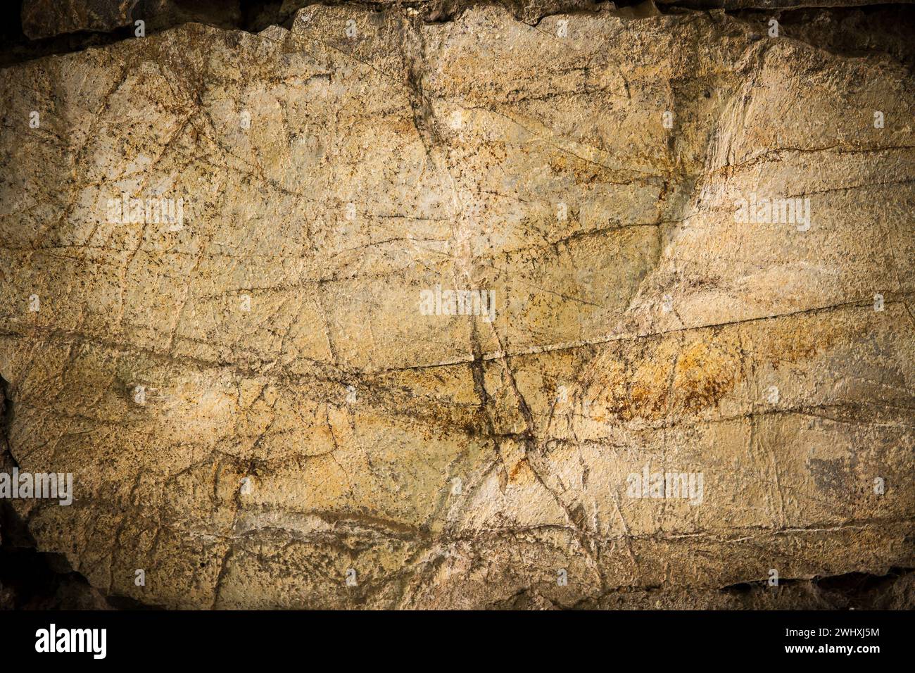 Dirty, scratched old stone wall Stock Photo