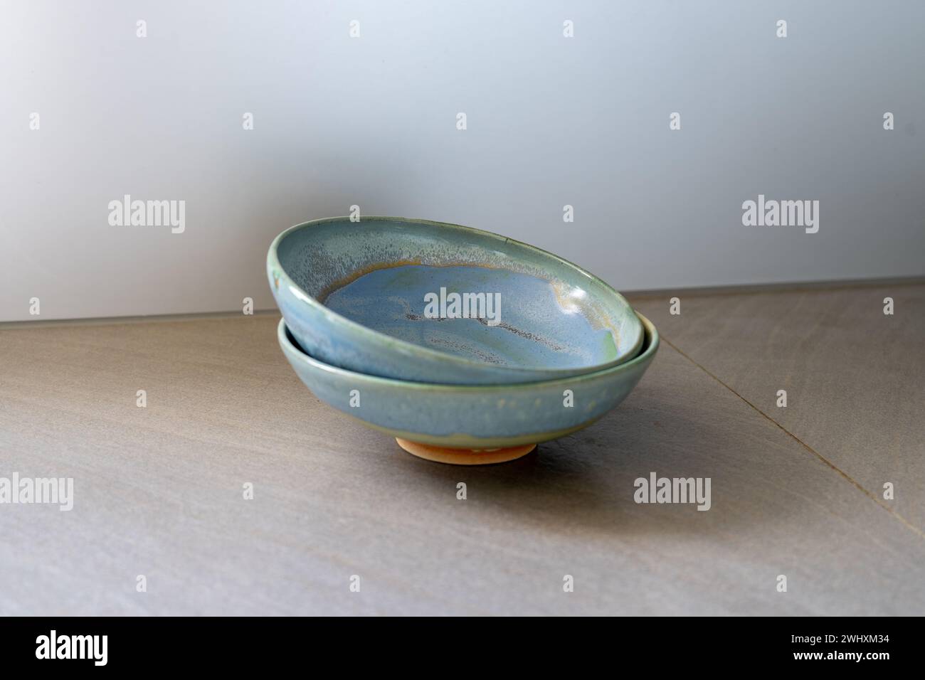 Two bowls on a grey table. High quality photo Stock Photo