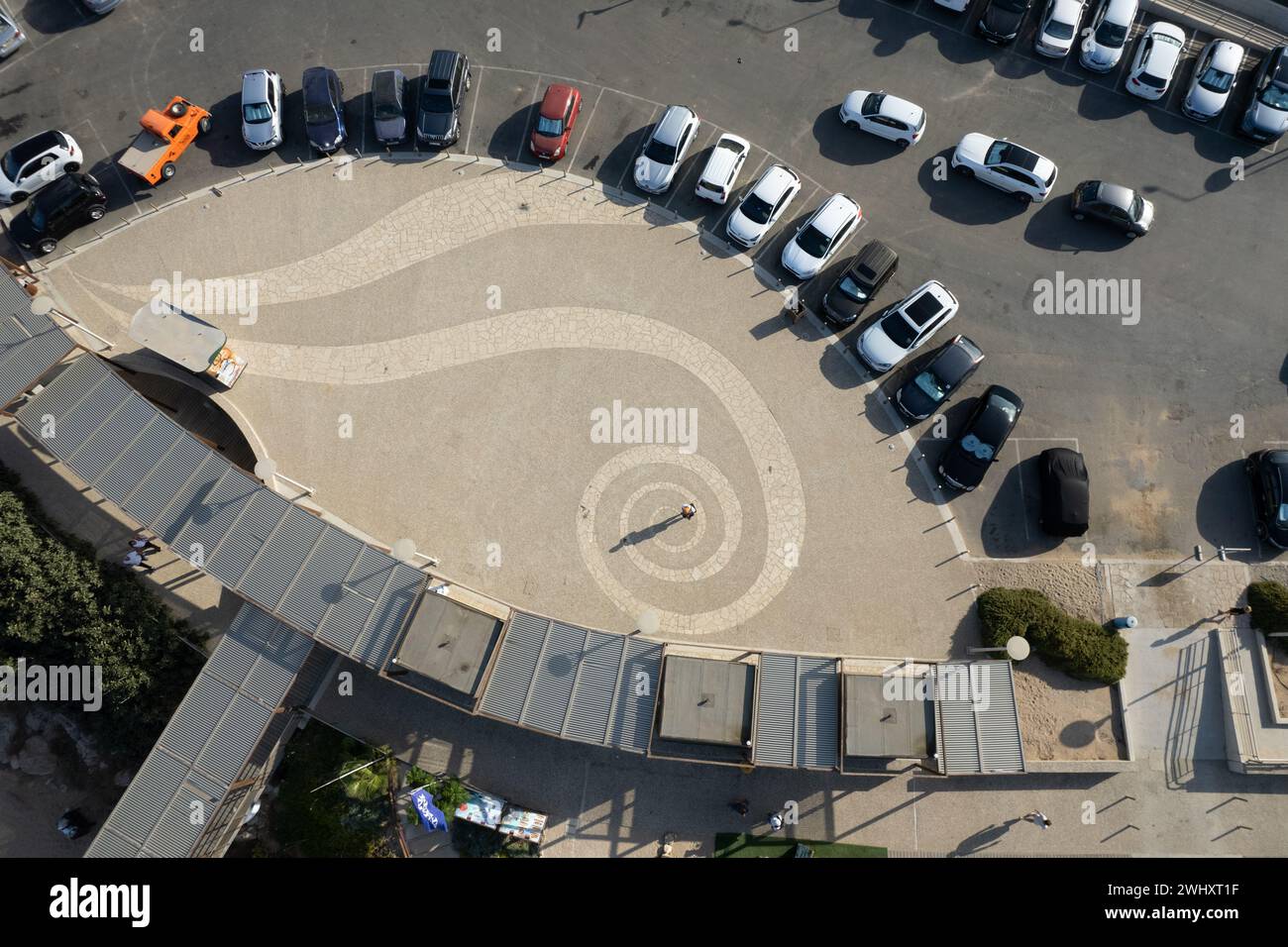 Drone aerial top view of car parking lot. Vehicles parked in a row on the street park outdoor Stock Photo