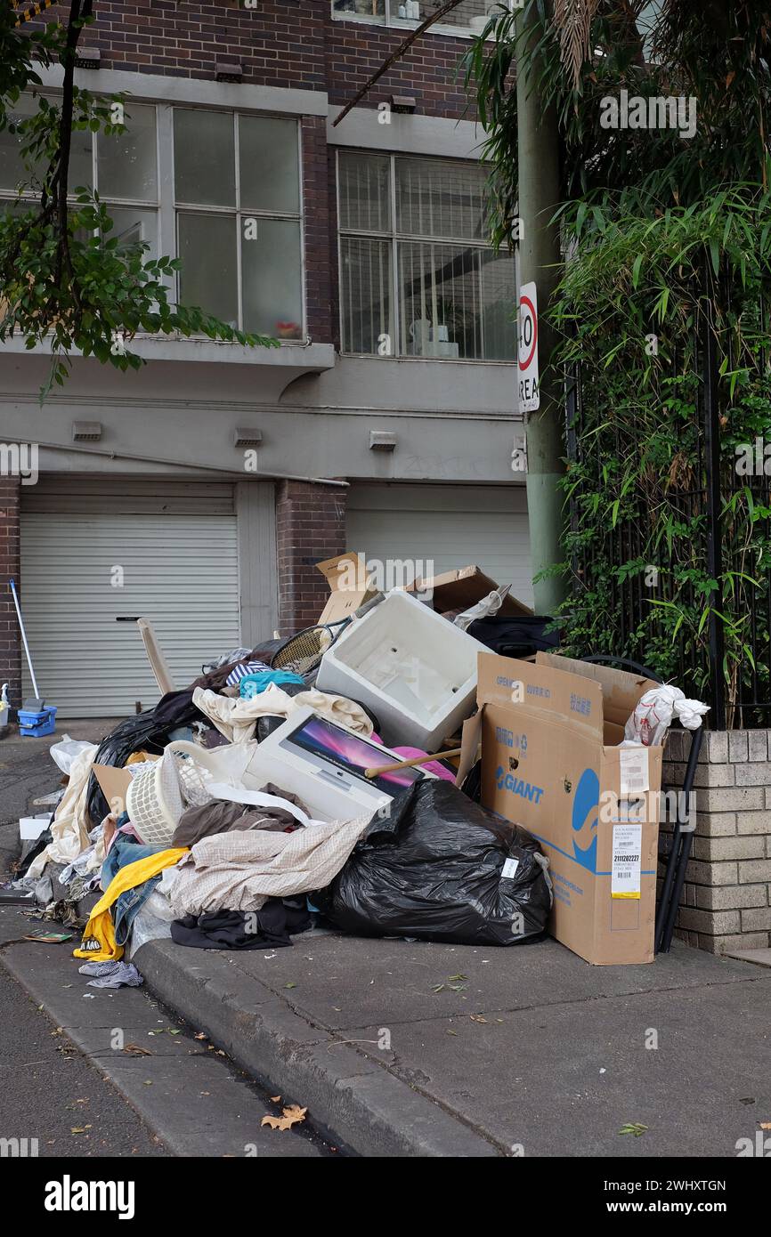 Signs of rental stress illegal dumping on the street of household