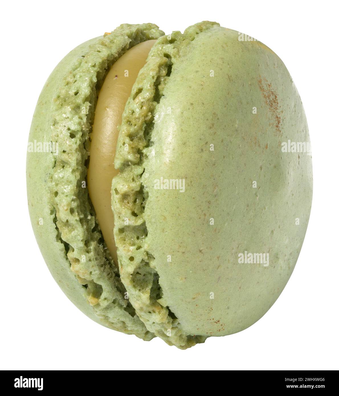 Green pistachio macaron on white isolated background Stock Photo