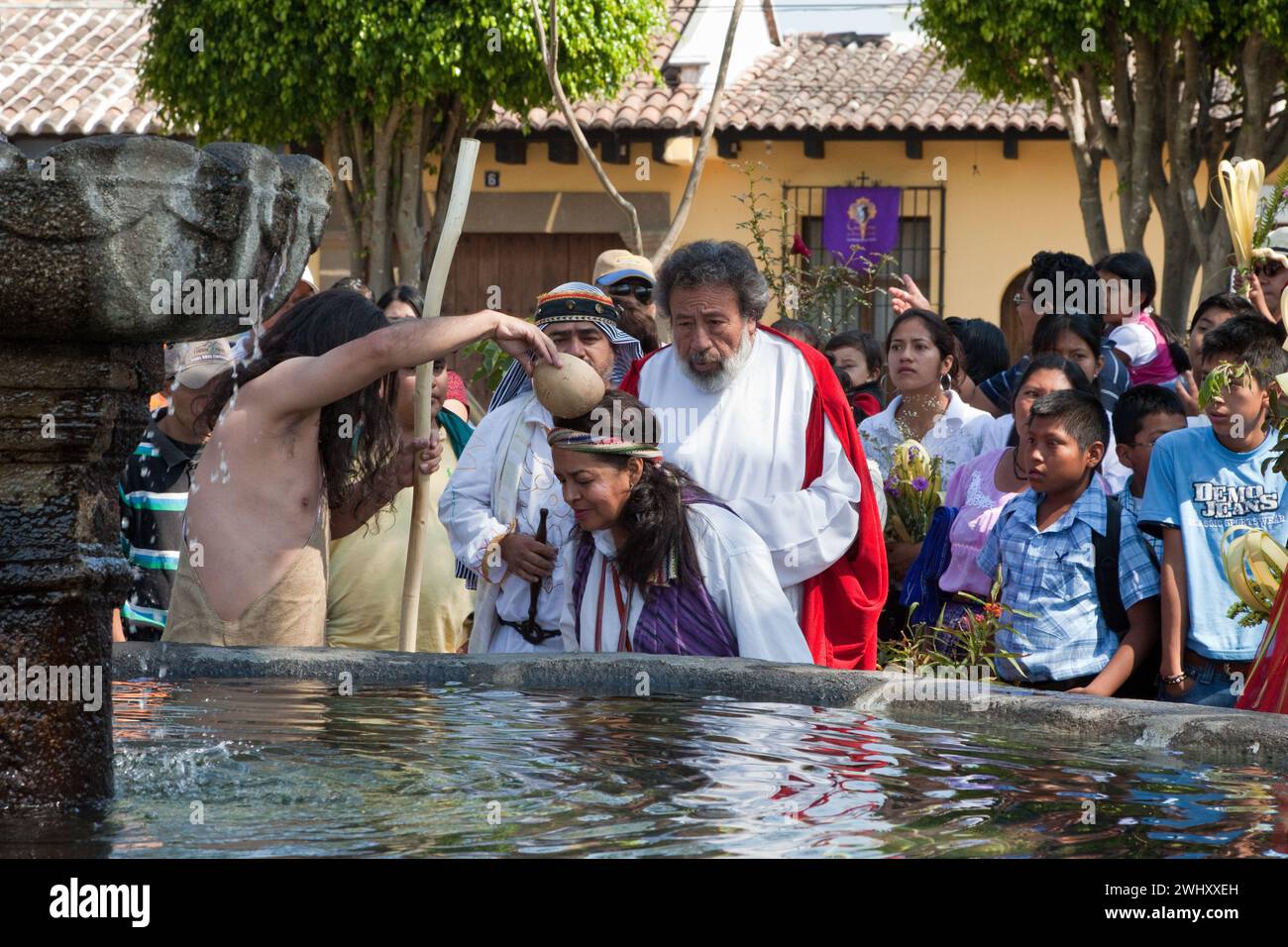 John the Baptist  Baptizing the Faithful.  Palm Sunday Re-enactment of events in the life of Jesus, by the group called Luna LLena (Full Moon), a grou Stock Photo