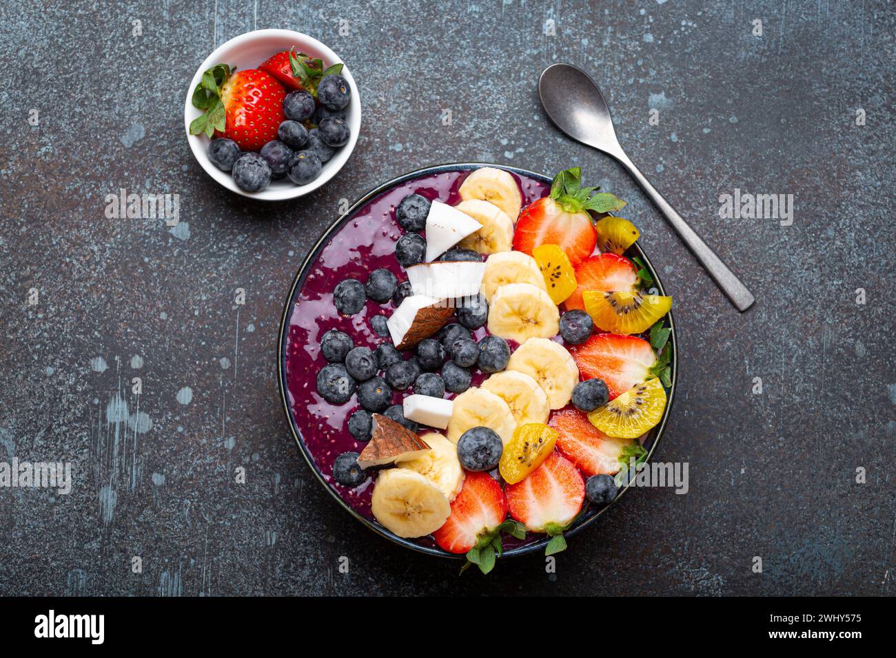 Healthy summer acai smoothie bowl with chia seeds, fresh banana ...