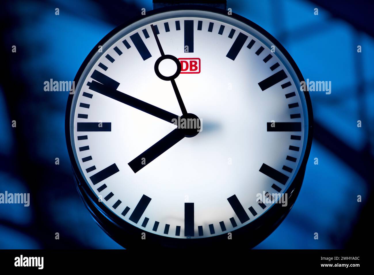 Station clock in the main train station in the early morning in October, detail, Cologne, Germany Stock Photo