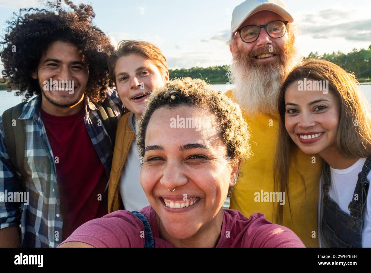 Wanderlust lifestyle, selfie, Multiracial young group of trendy people having fun together on vacation - Diverse millennial frie Stock Photo