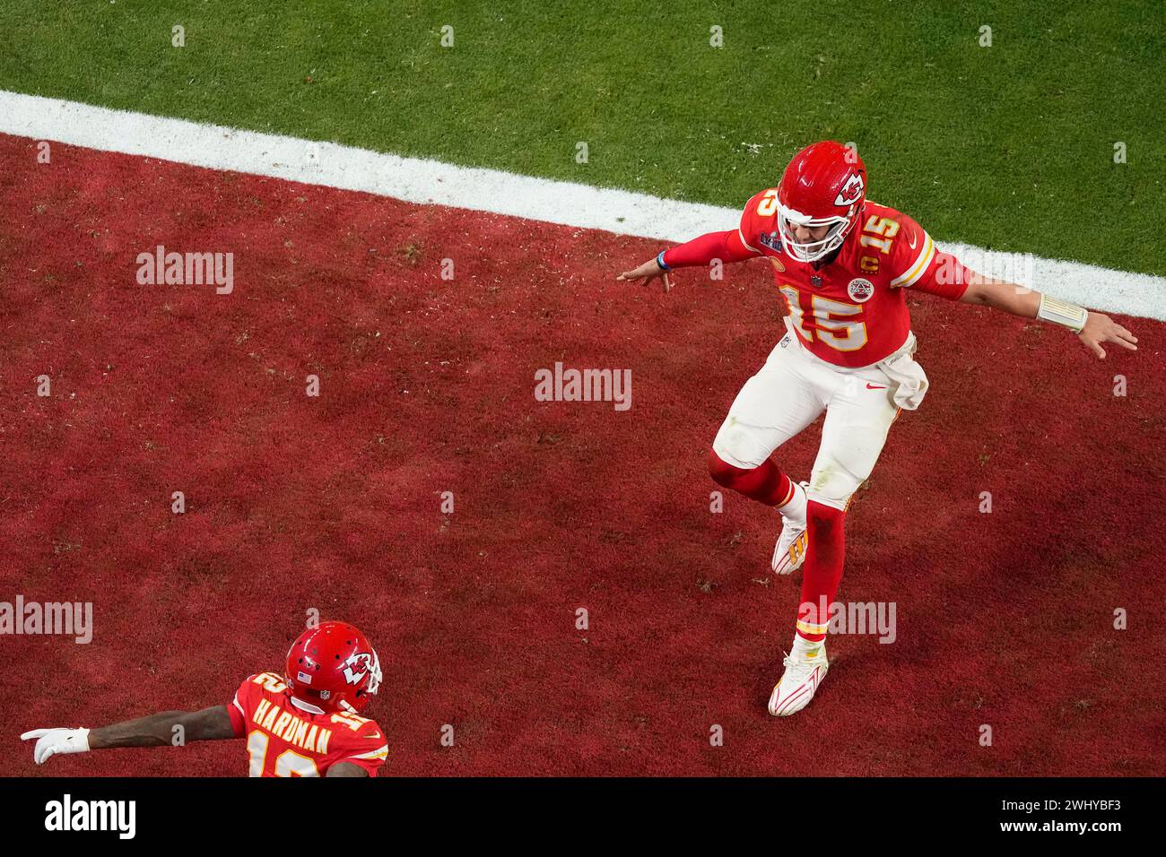 Kansas City Chiefs quarterback Patrick Mahomes, right, celebrates with ...