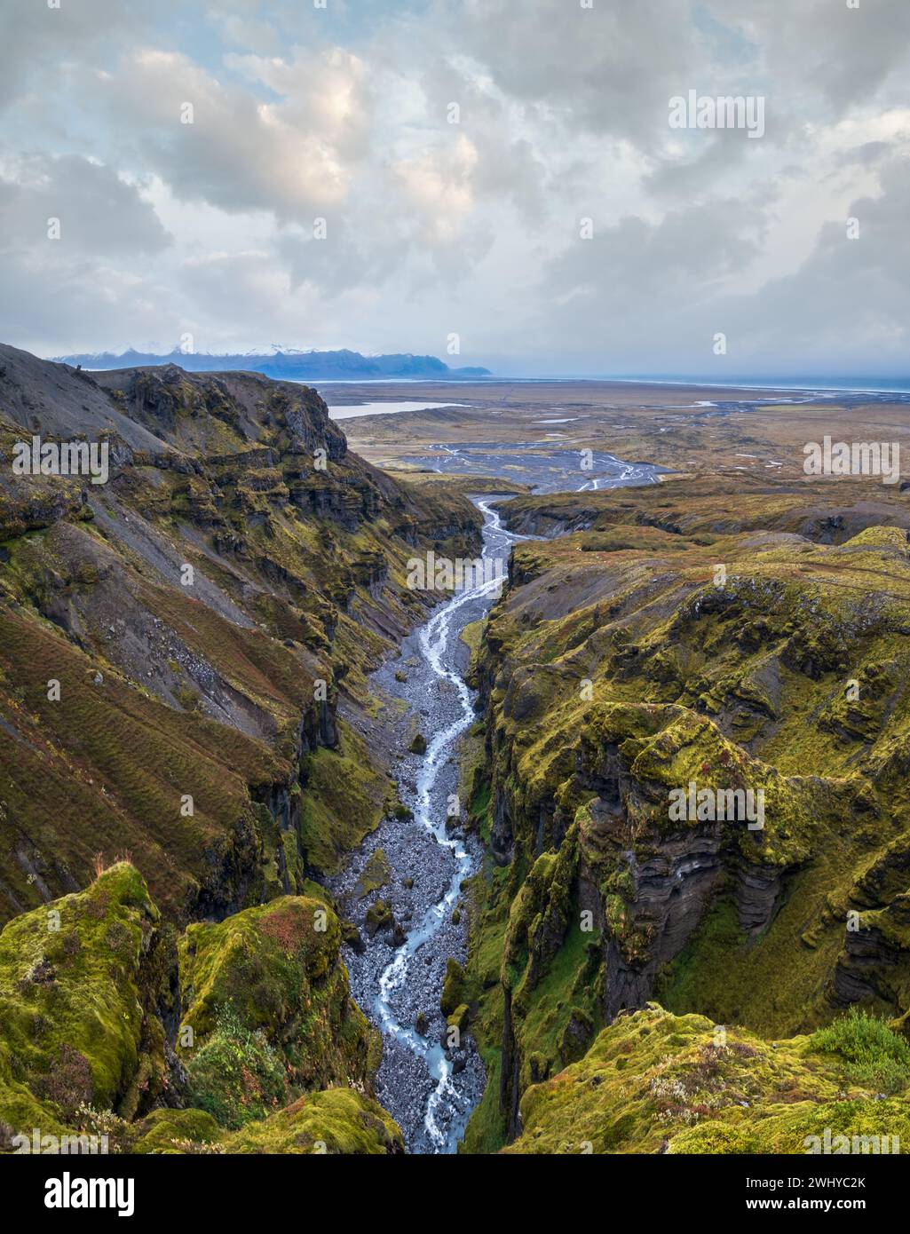 Beautiful autumn Mulagljufur Canyon, Iceland. It is located not far from Ring Road and Fjallsarlon glacier with Breidarlon ice l Stock Photo