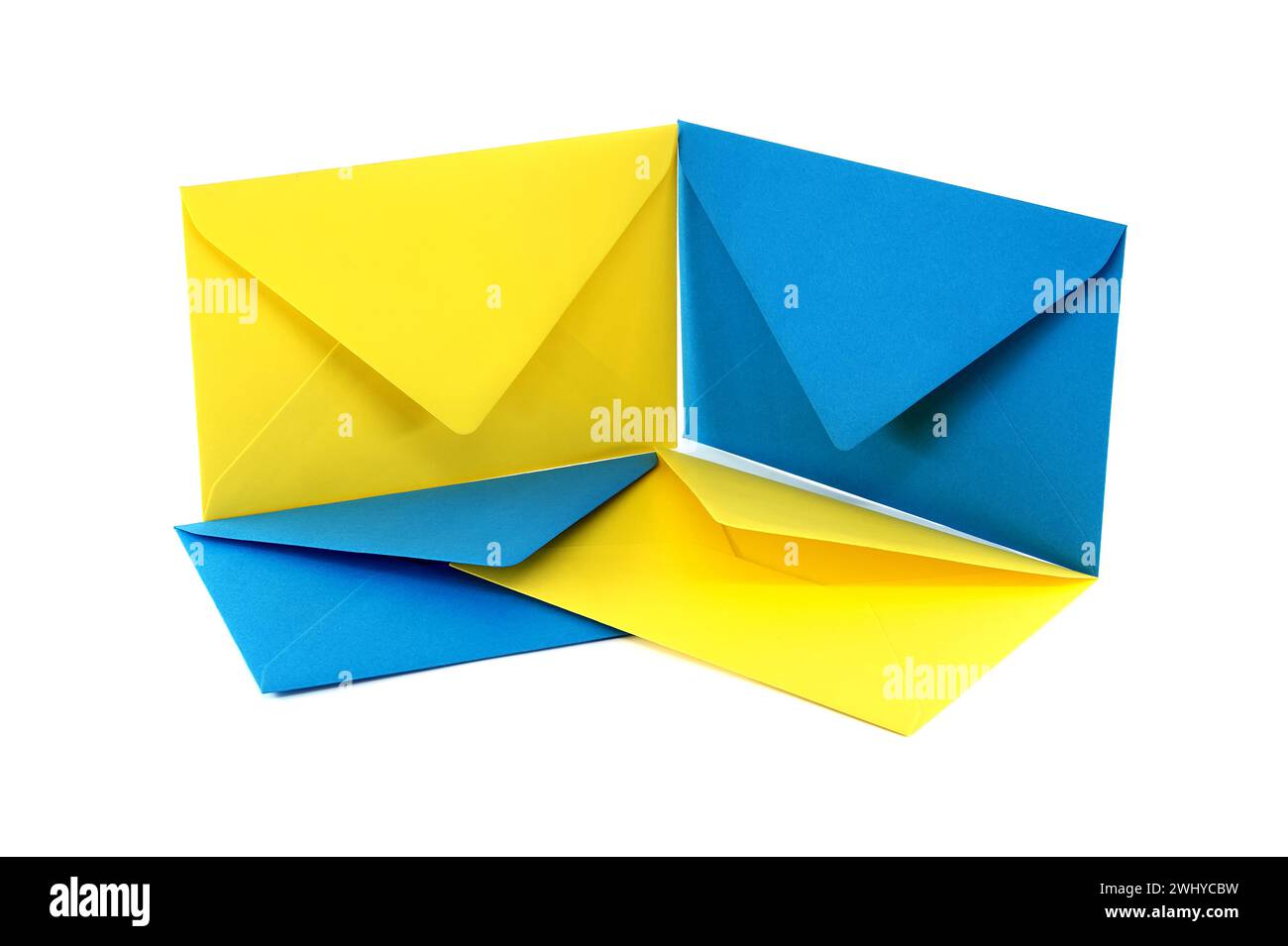 Four blue and yellow paper envelope arranged in a square formation ...