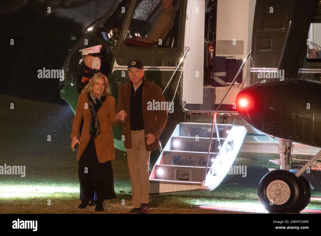 Washington, United States. 11th Feb, 2024. US President Joe Biden and First Lady Jill Biden walk on the South Lawn of the White House after arriving on Marine One in Washington, DC on Sunday, February 11, 2024. Biden urged Prime Minister Benjamin Netanyahu to shield civilians in Gaza from an Israeli military operation in the southern city of Rafah, saying it shouldn't proceed without a 'credible and executable plan' for their safety and support. Photo by Nathan Howard/UPI Credit: UPI/Alamy Live News Stock Photo