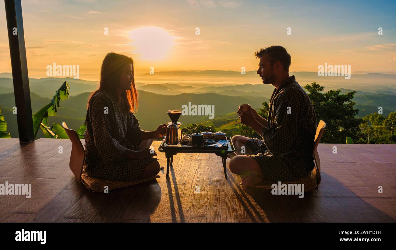A couple on vacation in Thailand waking up with drip coffee in the morning Stock Photo