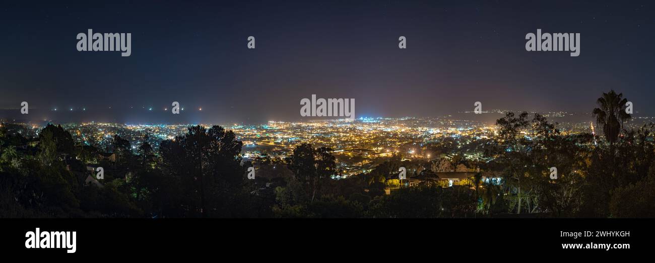 Aerial view, Santa Barbara, Night, City lights, Urban glow, Nighttime panorama, Cityscape, Nocturnal beauty, Urban illumination Stock Photo