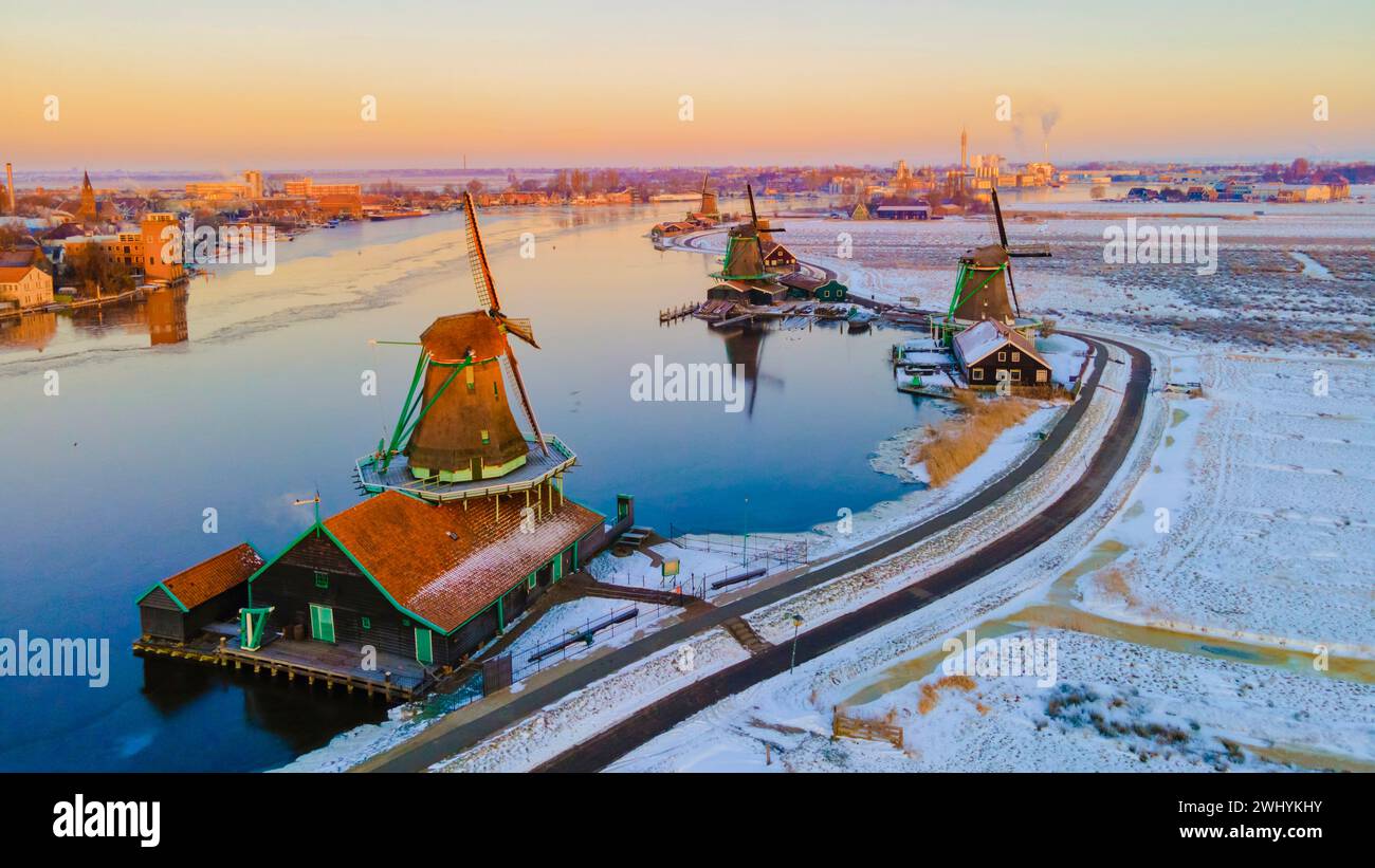 zaanse-schans-netherlands-a-dutch-windmill-village-during-sunset-whit
