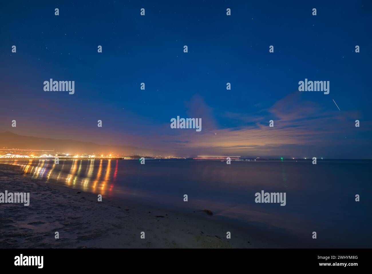 Santa Barbara, Coastline, Night, Ocean views, City lights, Coastal beauty, Nighttime, Pacific Ocean, Moonlit waves Stock Photo