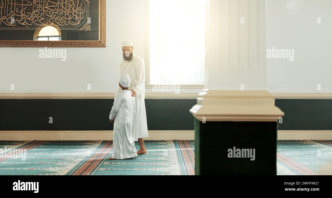 Islam, mosque and man walk child to Ramadan class for prayer to God, religion and worship for culture and learning. Muslim, kid and father hold hands Stock Photo
