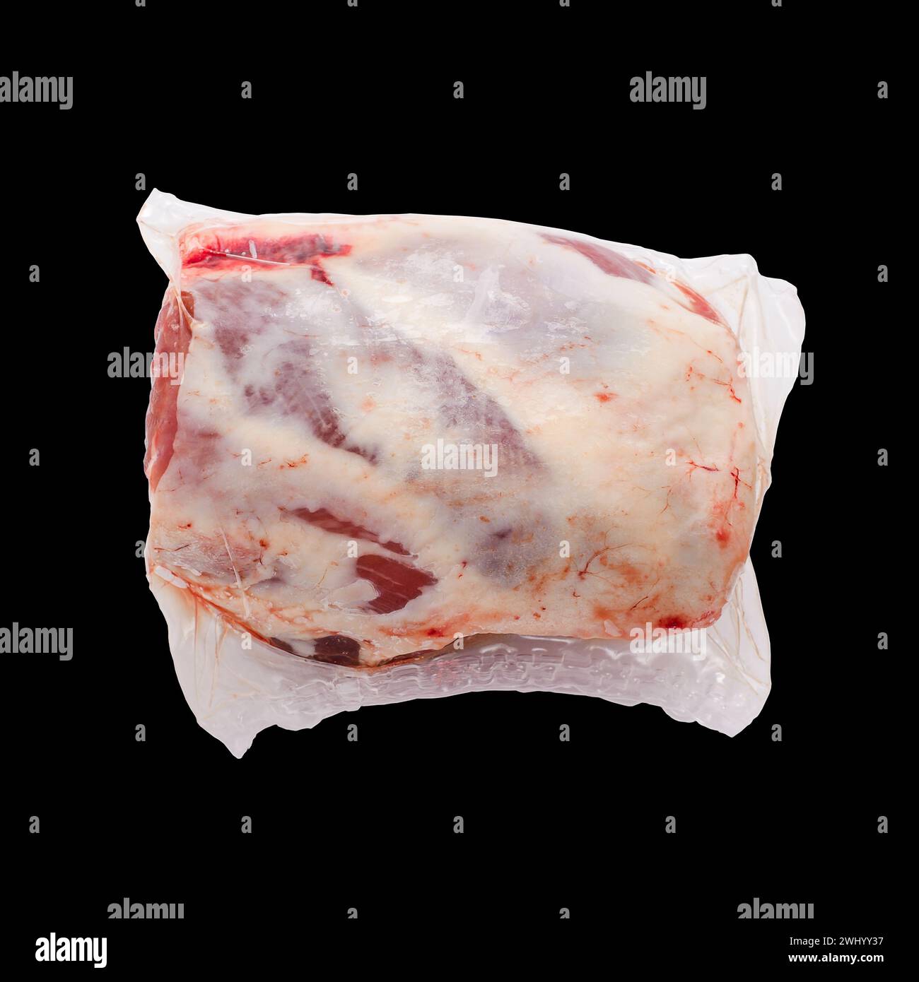 Frozen Lamb leg in package on black Stock Photo Alamy