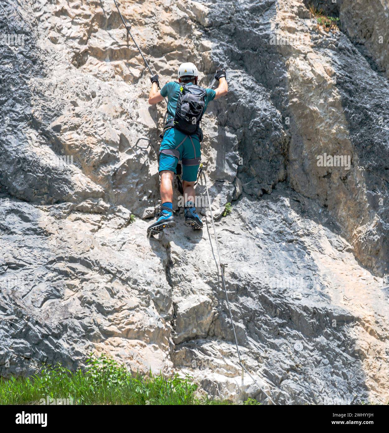 Mountaineer at Dalfazer Waterfall, Achensee, Tyrol, Austria, June Stock Photo