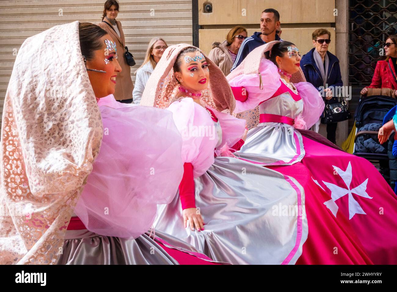 Women performing at Malta Carnival 2024, Valletta, Malta Stock Photo