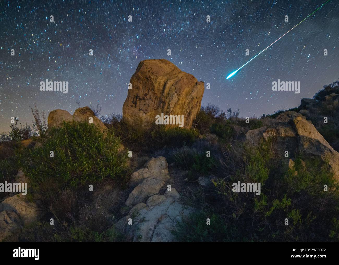 Bolide Meteorite, Intense Streak, Long Exposure, Meteor Tail, Multicolor, Astrophotography, Santa Barbara Mountains Stock Photo