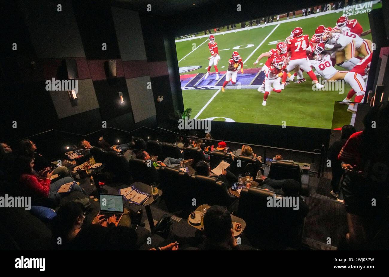 Vancouver, Canada. 11th Feb, 2024. Fans watch the Super Bowl LVIII NFL