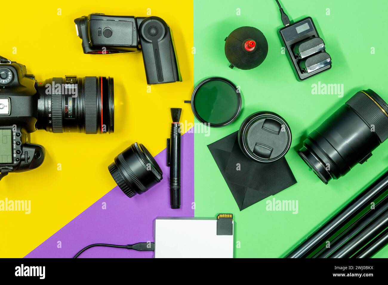 Photo and filmmaking accessories, flat lay. photographer's equipment and accessories on multicolored Stock Photo