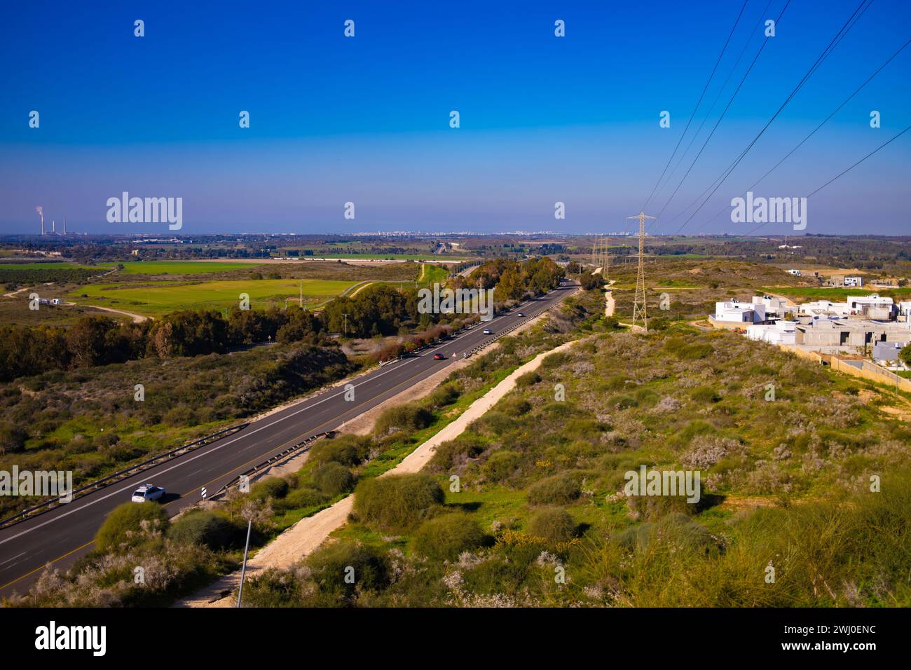 Elevated view capturing the serene landscape and busy highway on the border with Gaza-Hamas, viewed from Sderot. Stock Photo
