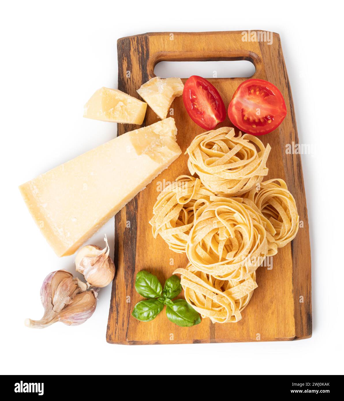 Pasta tagliatelle on a cutting board Stock Photo