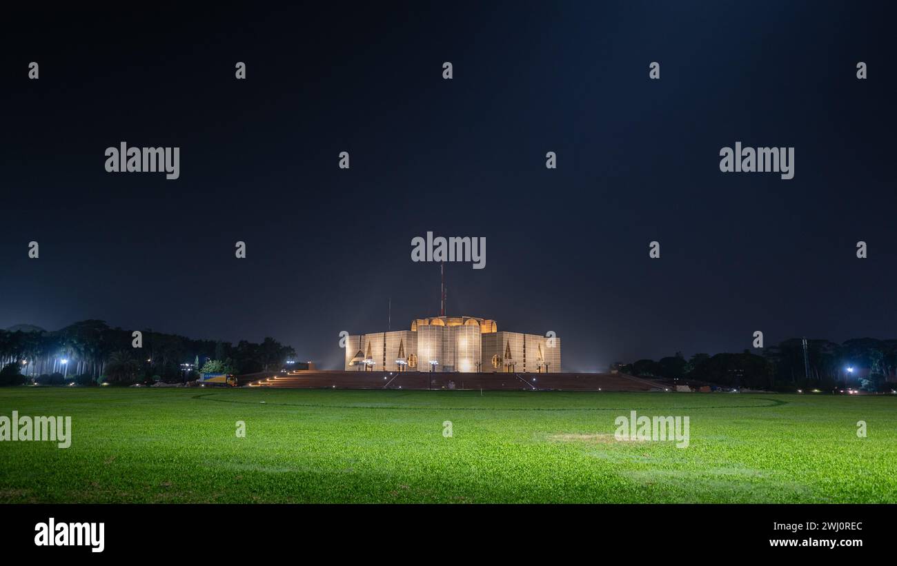 Dhaka, Bangladesh - 11 21 2023 : Landscape view of Jatiya Sangsad Bhaban or National Parliament Building at night Stock Photo