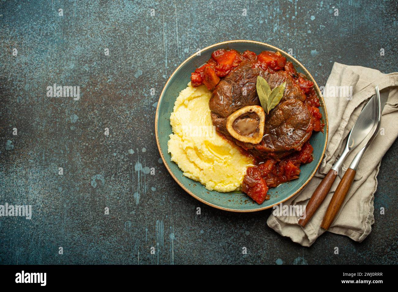 Traditional Italian dish Ossobuco all Milanese made with cut veal shank meat with vegetable