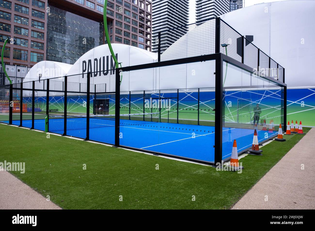 Padel tennis club Padium  at the heart of Canary Wharf financial district on 6th February 2024 in London, United Kingdom. Canary Wharf is an area located near the Isle of Dogs in the London Borough of Tower Hamlets and is defined by the Greater London Authority as being part of Londons central business district. Along with the City of London, it constitutes one of the main financial centres in the United Kingdom and the world, containing many high-rise buildings including the third-tallest in the UK, One Canada Square. Stock Photo