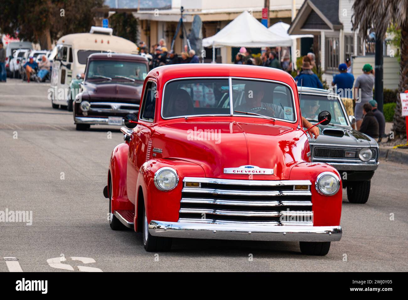A red classic Chevrolet 3100 pick up truck from the 1950s based hot rod in Morro Bay California in May of 2023, at  the 'Cruisin’ Morro Bay Car Show' Stock Photo