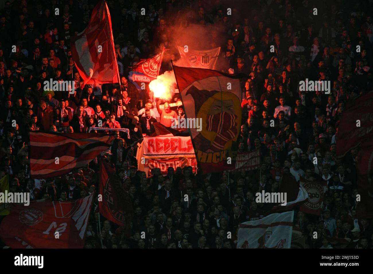 BayArena Leverkusen Germany,  10.2.2024, Football: Bundesliga Season 2023/2024 matchday 21.,  Bayer 04 Leverkusen (B04) vs FC Bayern Muenchen (FCB) — fans of Munich ultra group Schickeria light flares Stock Photo