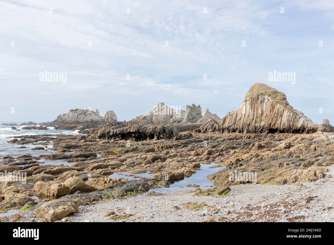 Beach scattered rock formations hi-res stock photography and images - Alamy