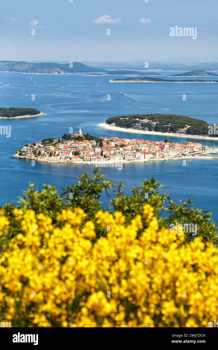 Primosten town on a peninsula in the Mediterranean Sea vacation portrait in PrimoÅ¡ten, Croatia Stock Photo