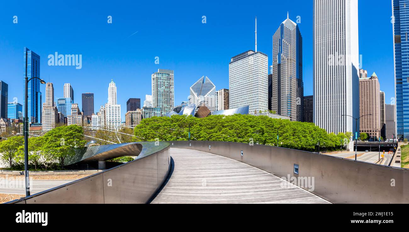 Chicago skyline skyscrapers skyscrapers and BP Pedestrian Bridge bridge skyscraper panorama in the USA Stock Photo