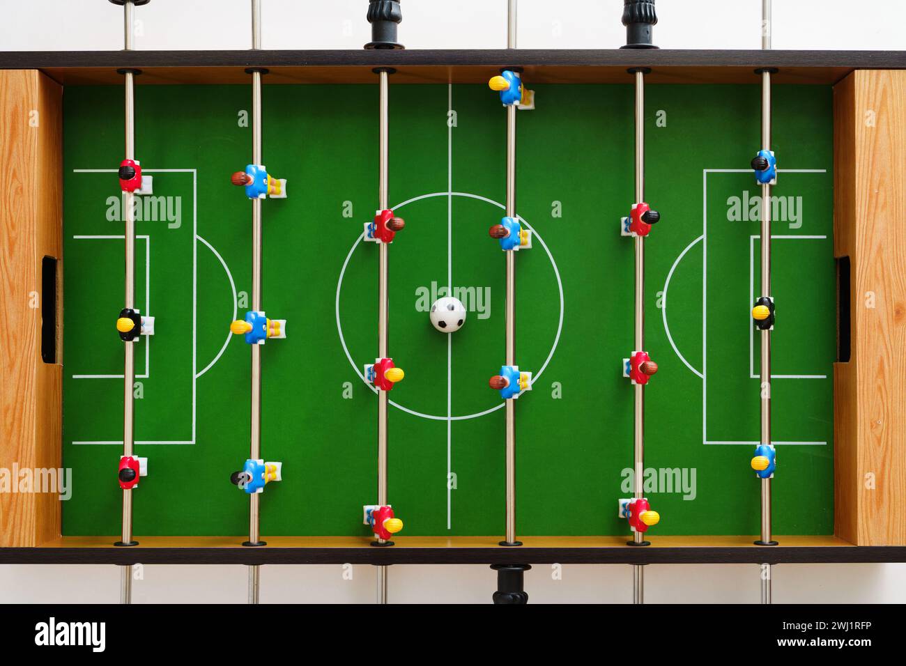 Top view of a table football game in progress Stock Photo