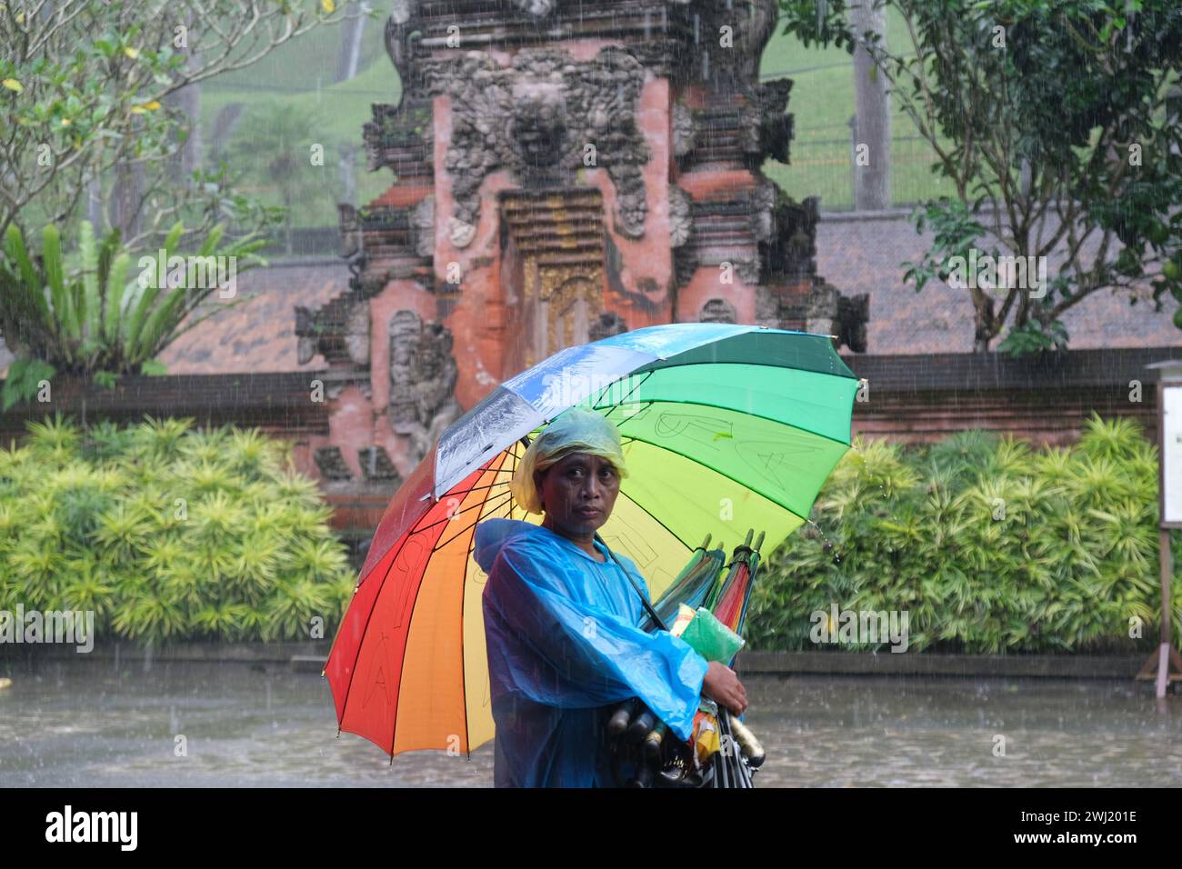 Rain umbrella indonesia hi-res stock photography and images - Alamy