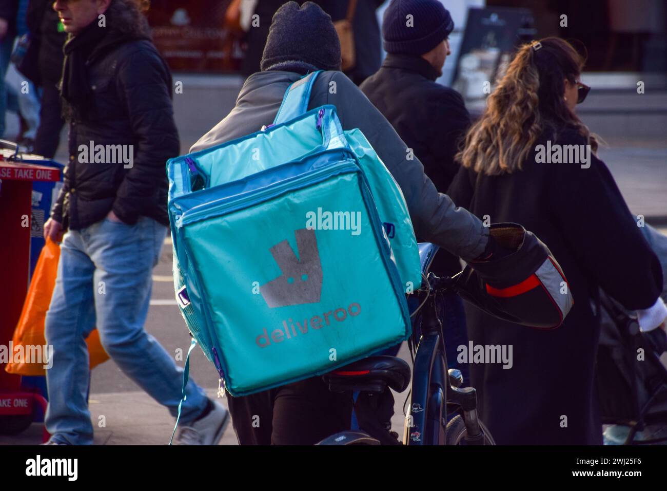 London, England, UK. 12th Feb, 2024. A Deliveroo rider in Central ...