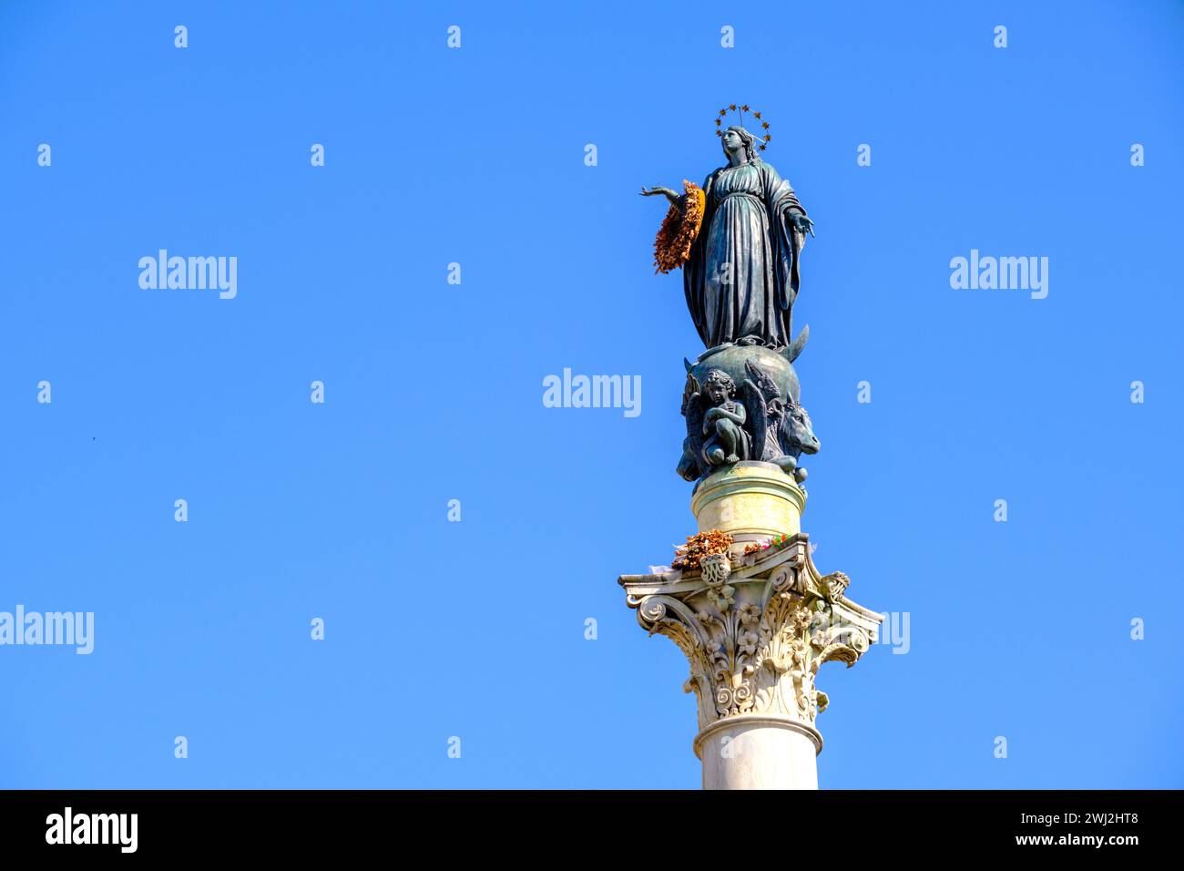 Statue at the top of the Column of the Immaculate Conception in Rome Stock Photo
