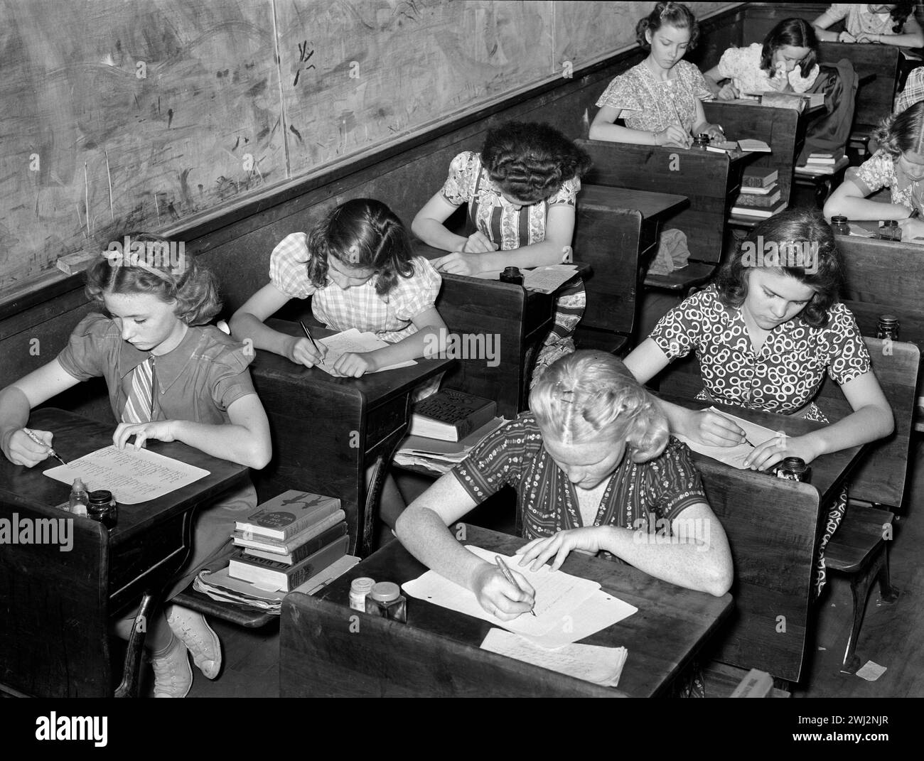 High School students doing school work in classroom, San Augustine, Texas, USA, Russell Lee, U.S. Farm Security Administration, April 1939 Stock Photo