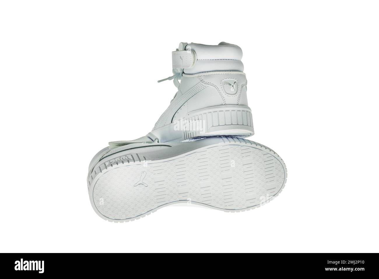 Close-up view of high-top white Puma sneakers on white background. Sweden. Stock Photo