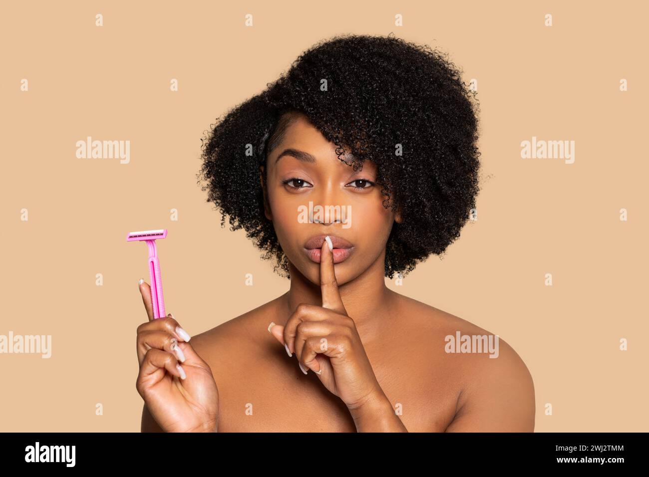 Secret of smooth skin with pink razor Stock Photo