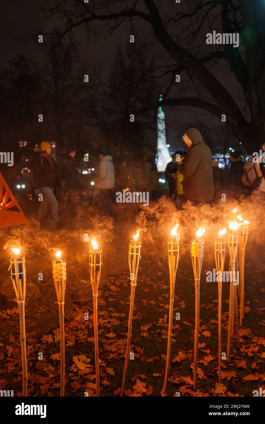 Evening Festivities with Torches for Latvia's Day of Independence Stock Photo