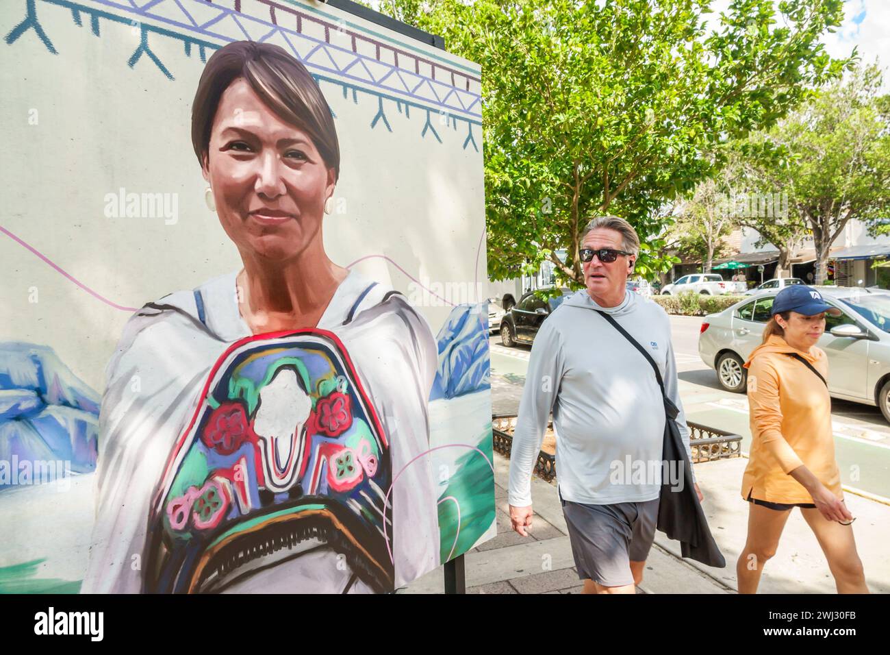 Merida Mexico,Merida Mexico,Zona Paseo Montejo Centro,sidewalk exhibit female man men male,woman women lady female,adult adults resident residents,cou Stock Photo