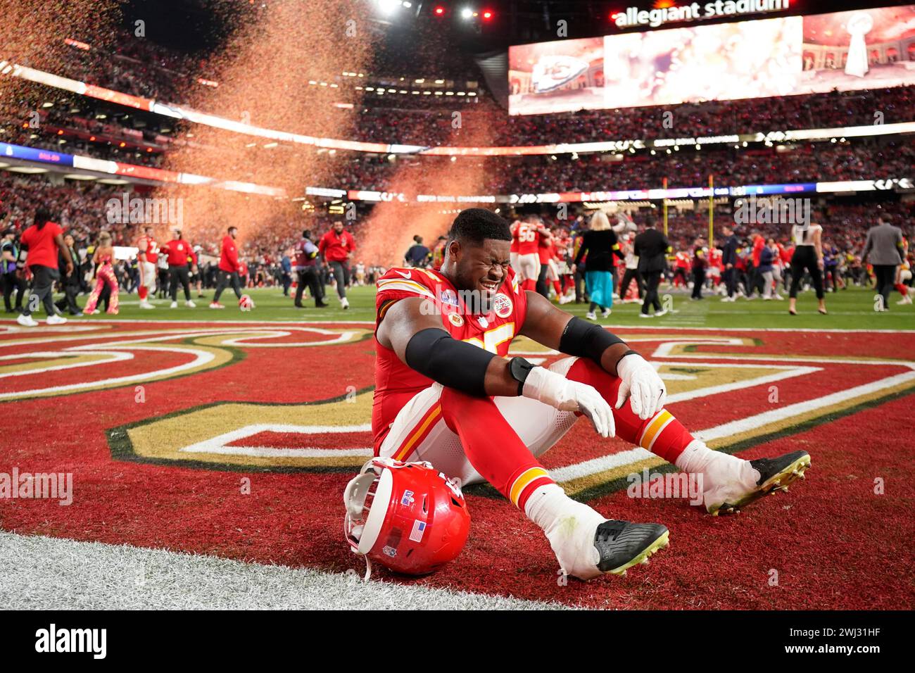 Kansas City Chiefs guard Trey Smith cries after winning the NFL Super Bowl 58 football game
