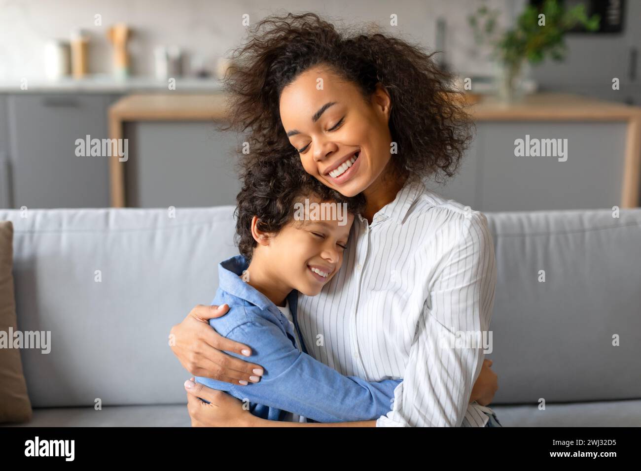 Mother son share smiles hi-res stock photography and images - Alamy