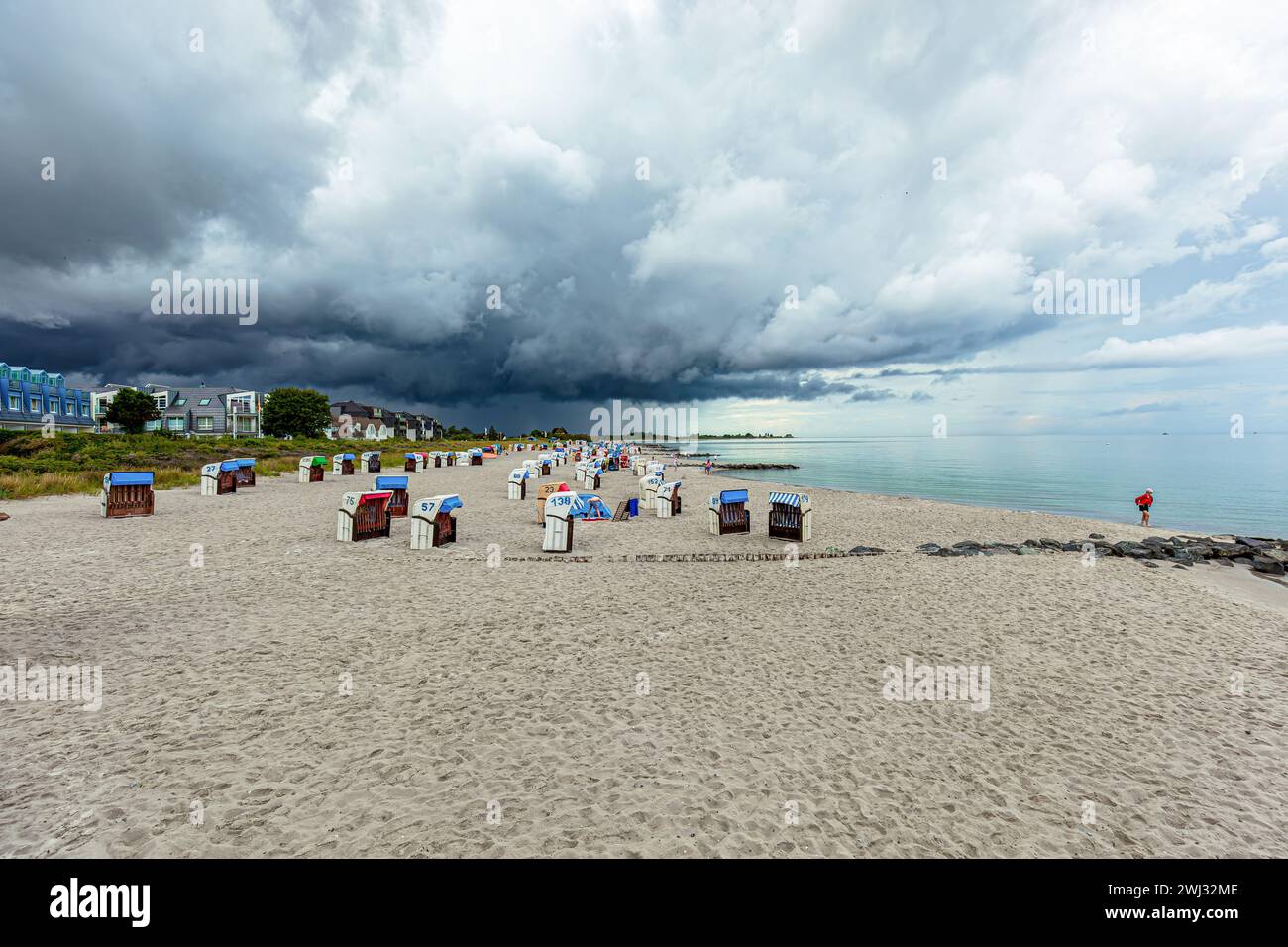 Clouds over the beach. storm clouds over the sea. Coast Landscape in Germany. Baltic sea with dramat Stock Photo
